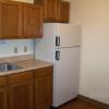 Complete with refrigerator and a  deep stainless steel sink.